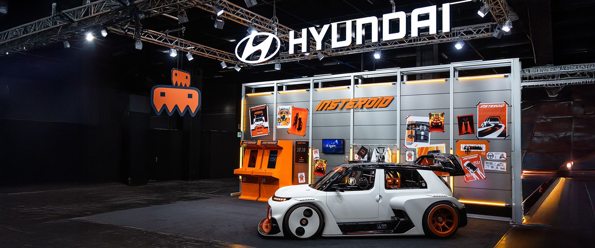 Hyundai Motor Company's booth in the ‘Retro & Family Area’ at gamescom 2025, featuring the INSTEROID concept car and its self-developed ‘INSTEROID Retro Arcade’ game.
