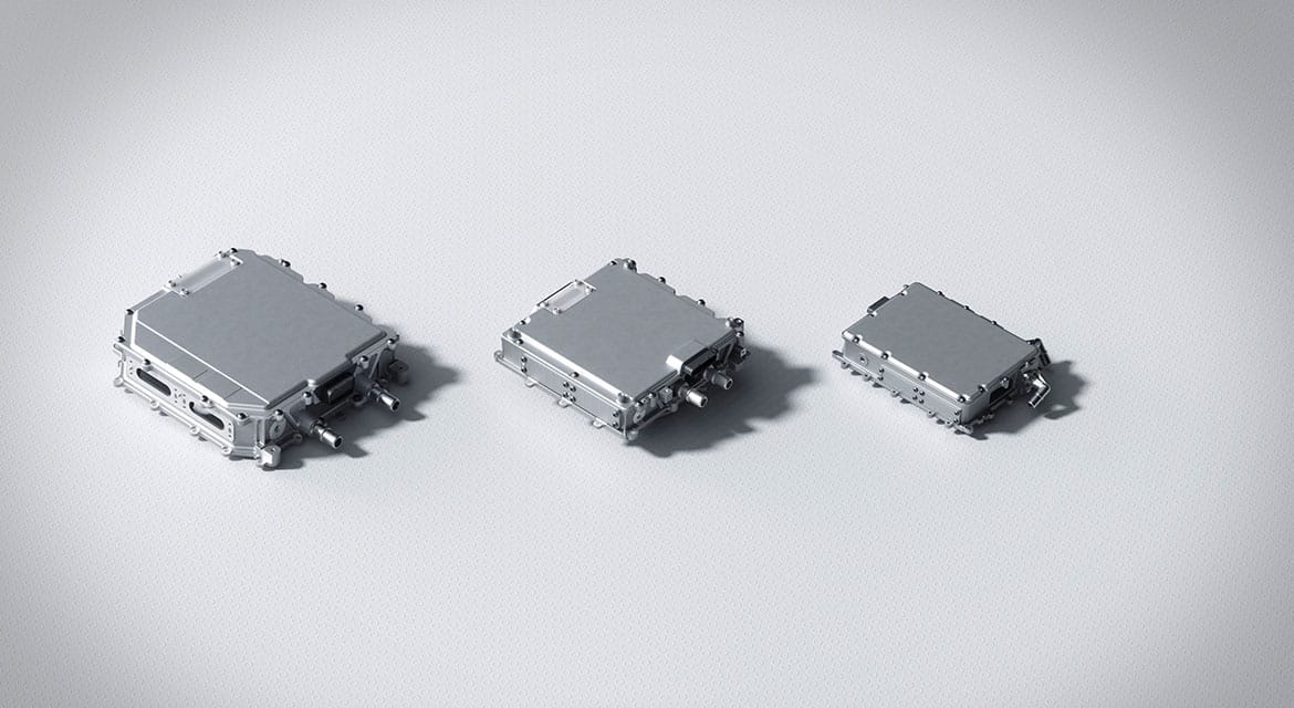 The enhancement in the power module design allows for higher power density within a smaller package, enabling high output without increasing overall dimensions.