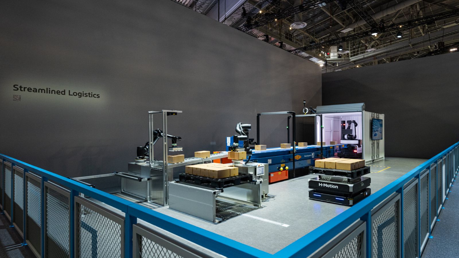 Boston Dynamics' Stretch, a logistics loading and unloading robot, along with Hyundai WIA's Collaborative Robot (Cobot) and Autonomous Mobile Robot (AMR), are being showcased in a logistics demonstration involving loading, transportation, and unloading tasks. 