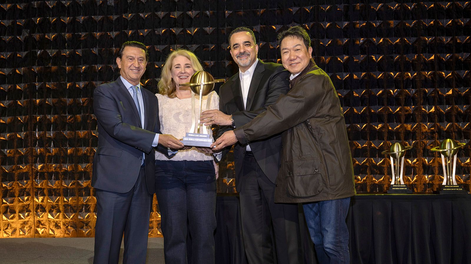 (From left) José Muñoz, President and CEO of Hyundai Motor Company; Jennifer Newman, World Car Awards juror and Editor-in-Chief of Cars.com; Randy Parker, President and CEO of Hyundai Motor North America; and SangYup Lee, Executive Vice President and Head of Hyundai and Genesis Global Design