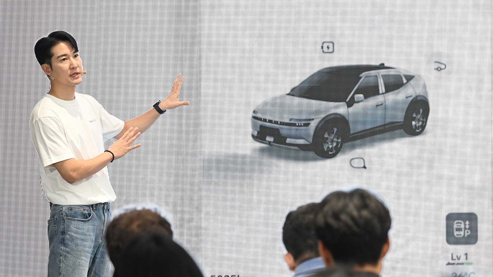 Changsub Kim, Senior Research Engineer, UX Strategy Team at Hyundai Motor Group, presents the user experience (UX) of Pleos Connect at the media day.
