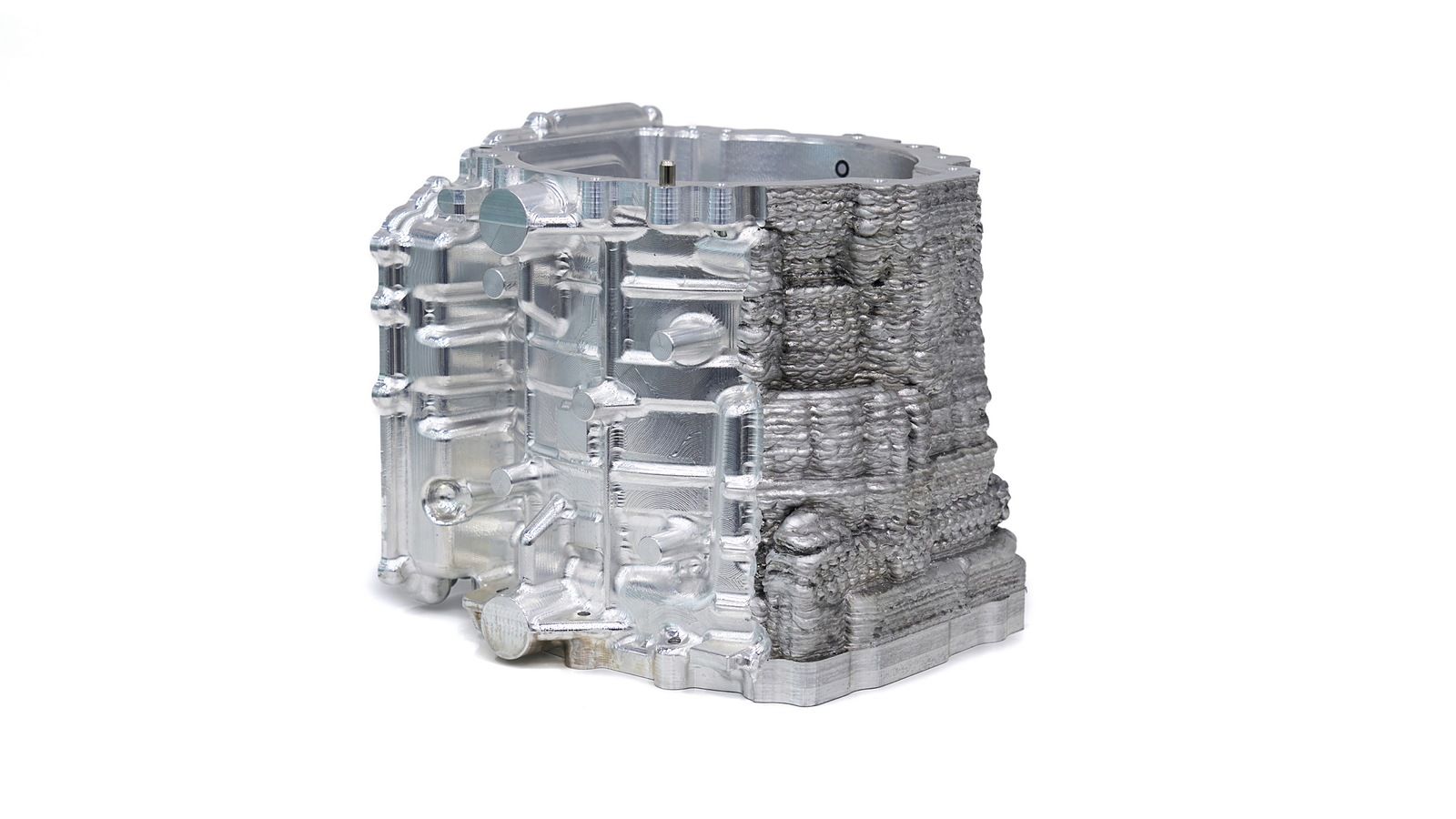 A sample metal component after partial CNC machining, demonstrating post-processing of an additively manufactured part.