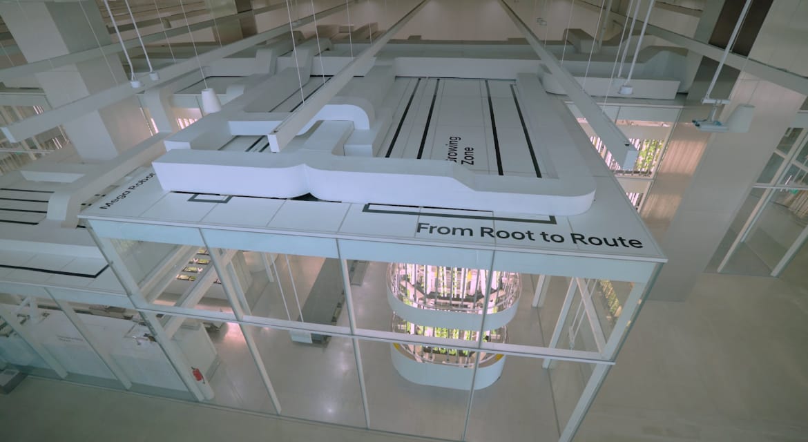 Tucked inside a facility built for robotics and vehicle assembly is a fully automated indoor farm where leafy greens grow under climate-controlled conditions, untouched by weather, pests or soil.