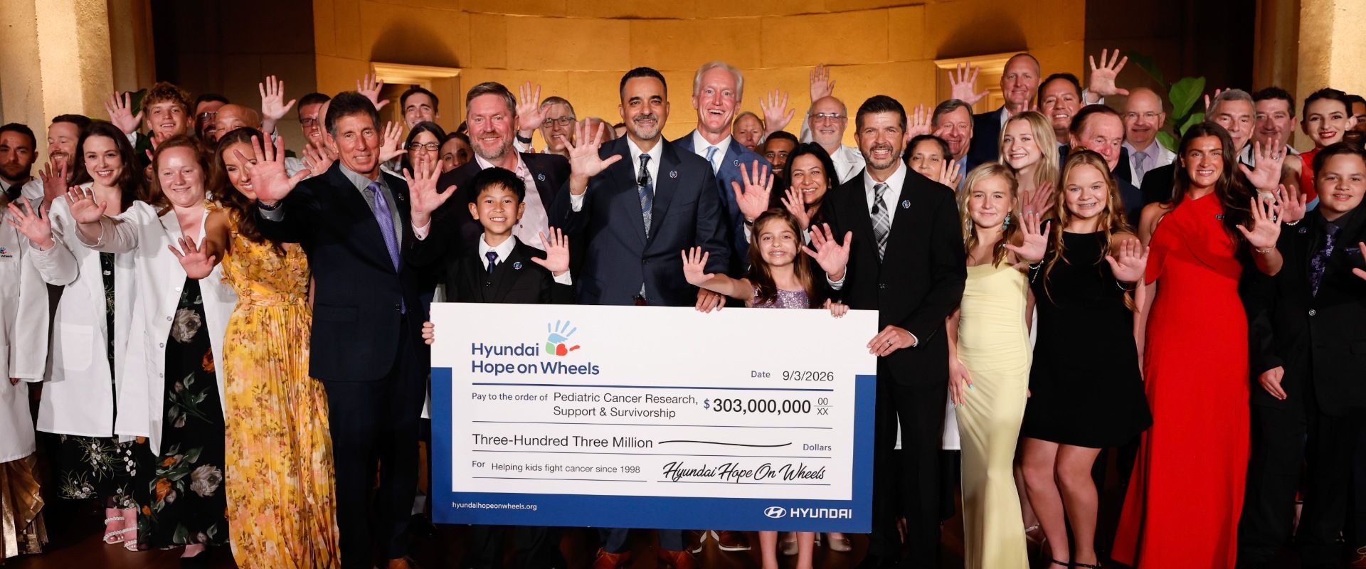 (center) Randy Parker, president and CEO, Hyundai Motor North America; (center right) Kevin Reilly, vice chair, Hyundai Hope on Wheels; Hyundai Hope on Wheels board of directors, national youth ambassadors, and grant recipients at the Andrew W. Mellon Auditorium in Washington, D.C., on Sept. 3, 2026 (Photo/Hyundai)