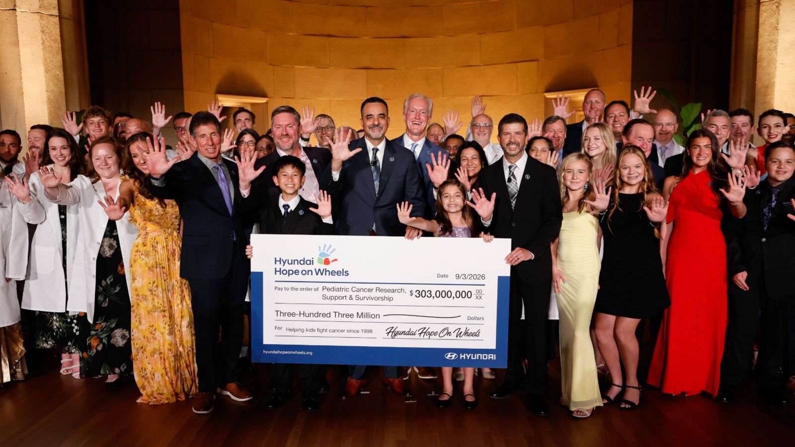 (center) Randy Parker, president and CEO, Hyundai Motor North America; (center right) Kevin Reilly, vice chair, Hyundai Hope on Wheels; Hyundai Hope on Wheels board of directors, national youth ambassadors, and grant recipients at the Andrew W. Mellon Auditorium in Washington, D.C., on Sept. 3, 2026 (Photo/Hyundai)