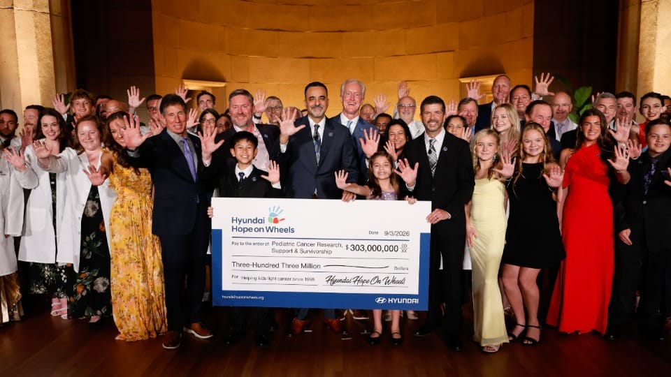 (center) Randy Parker, president and CEO, Hyundai Motor North America; (center right) Kevin Reilly, vice chair, Hyundai Hope on Wheels; Hyundai Hope on Wheels board of directors, national youth ambassadors, and grant recipients at the Andrew W. Mellon Auditorium in Washington, D.C., on Sept. 3, 2026 (Photo/Hyundai)