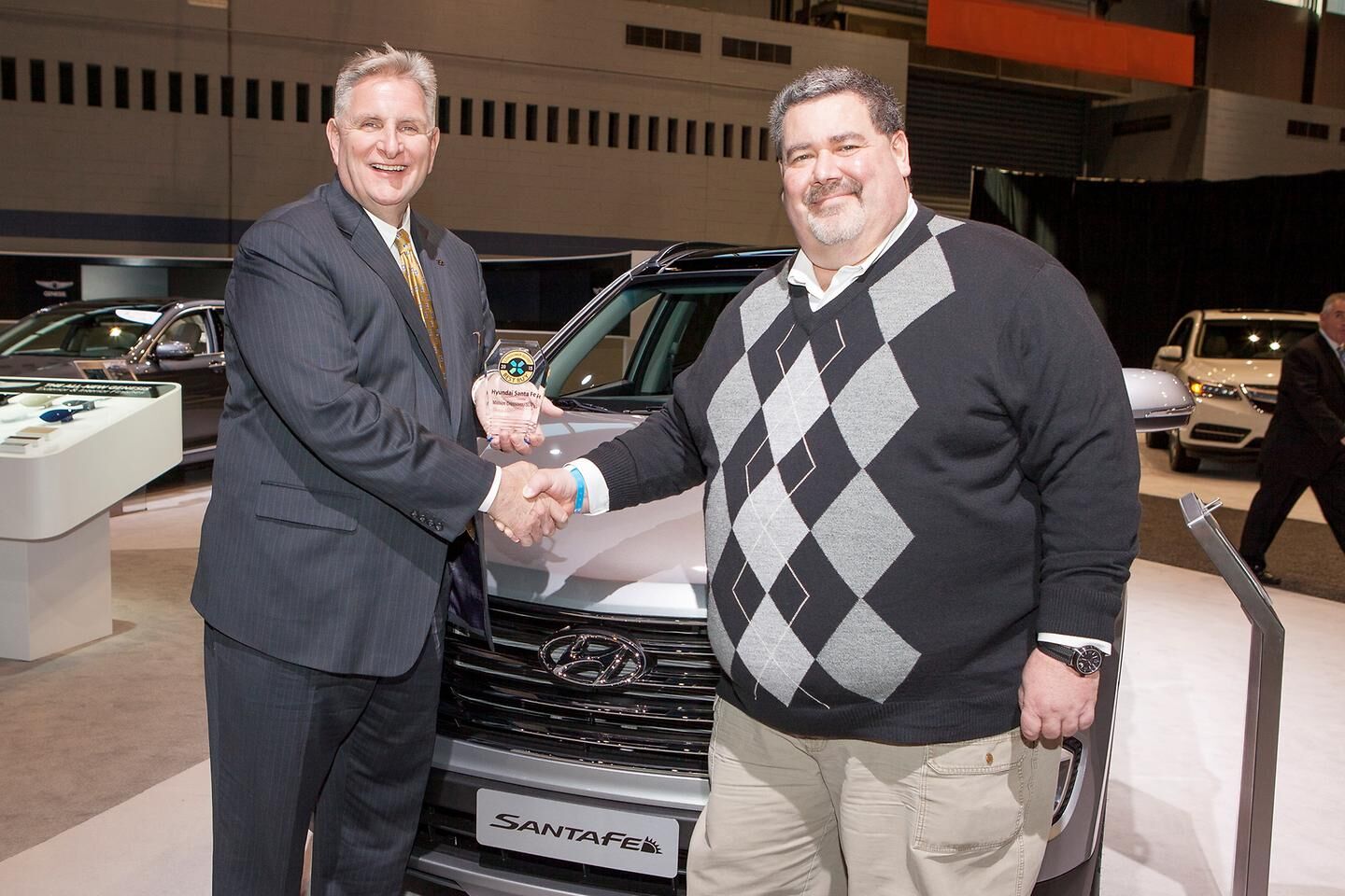 Hyundai Genesis And Santa Fe Earn 2015 Consumer Guide Automotive Best Buy Awards