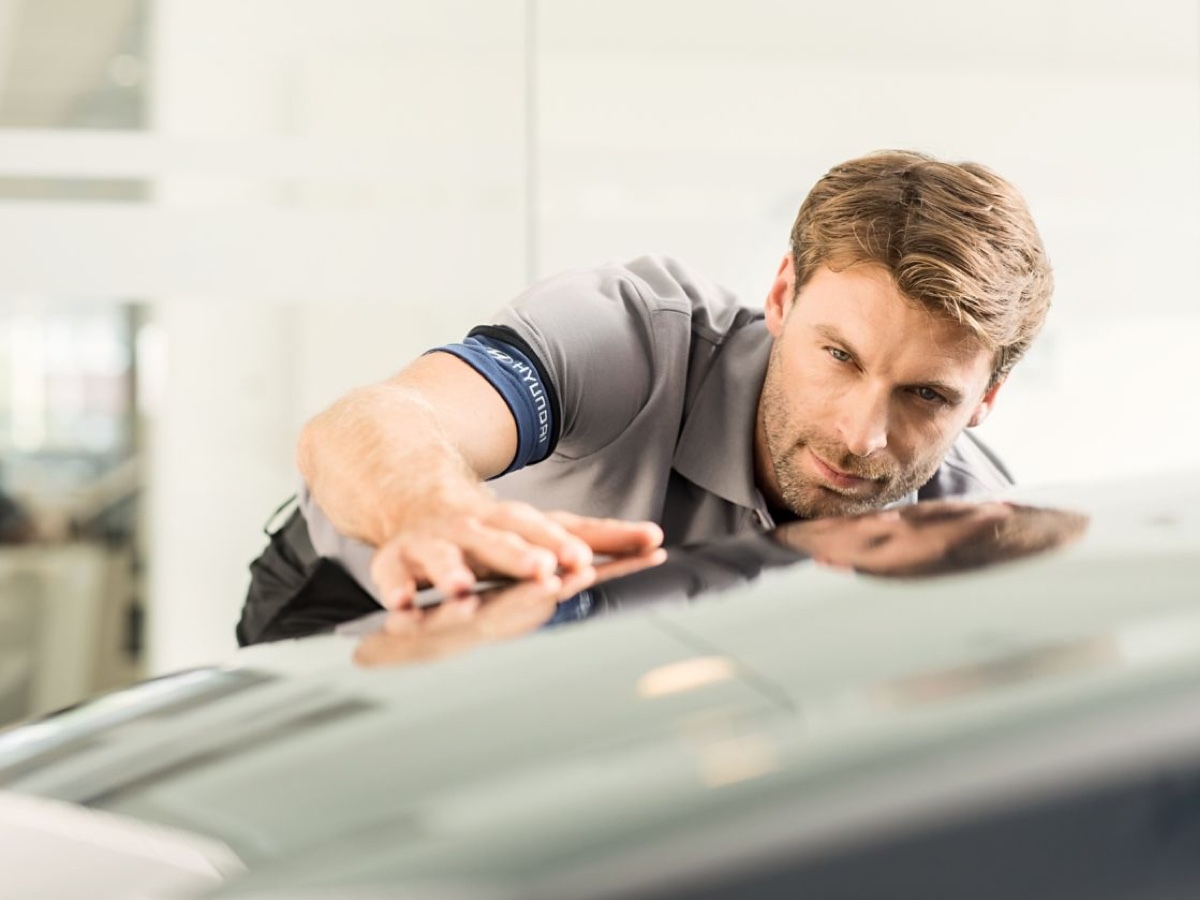 Mood image akin to that on the marketing page, ideally of a person looking at a car.
