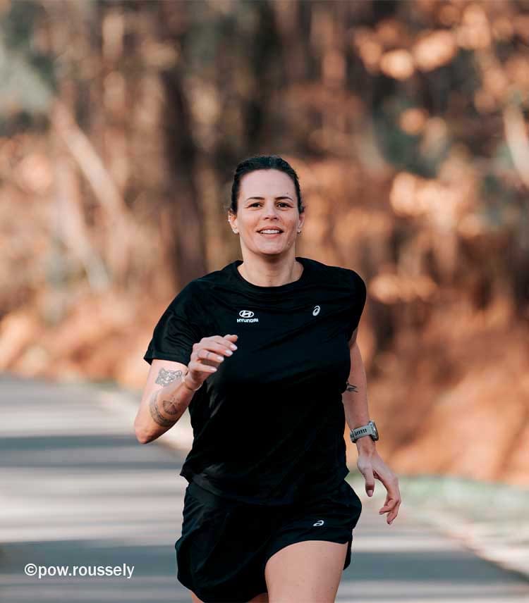 Photo de Laure Manaudou en train de courir par ©pow.roussely.