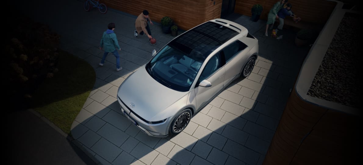 The Hyundai IONIQ 5 driving on a road