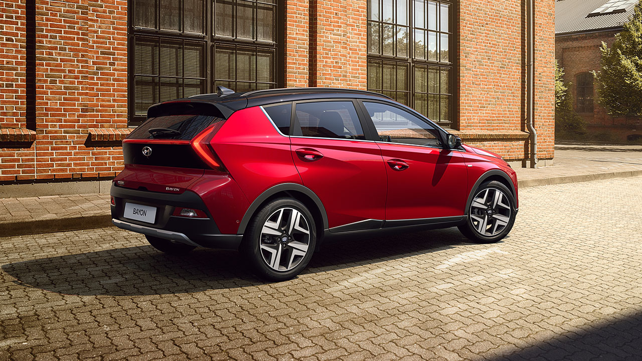 Hyundai BAYON in Dragon Red Pearl from the rear