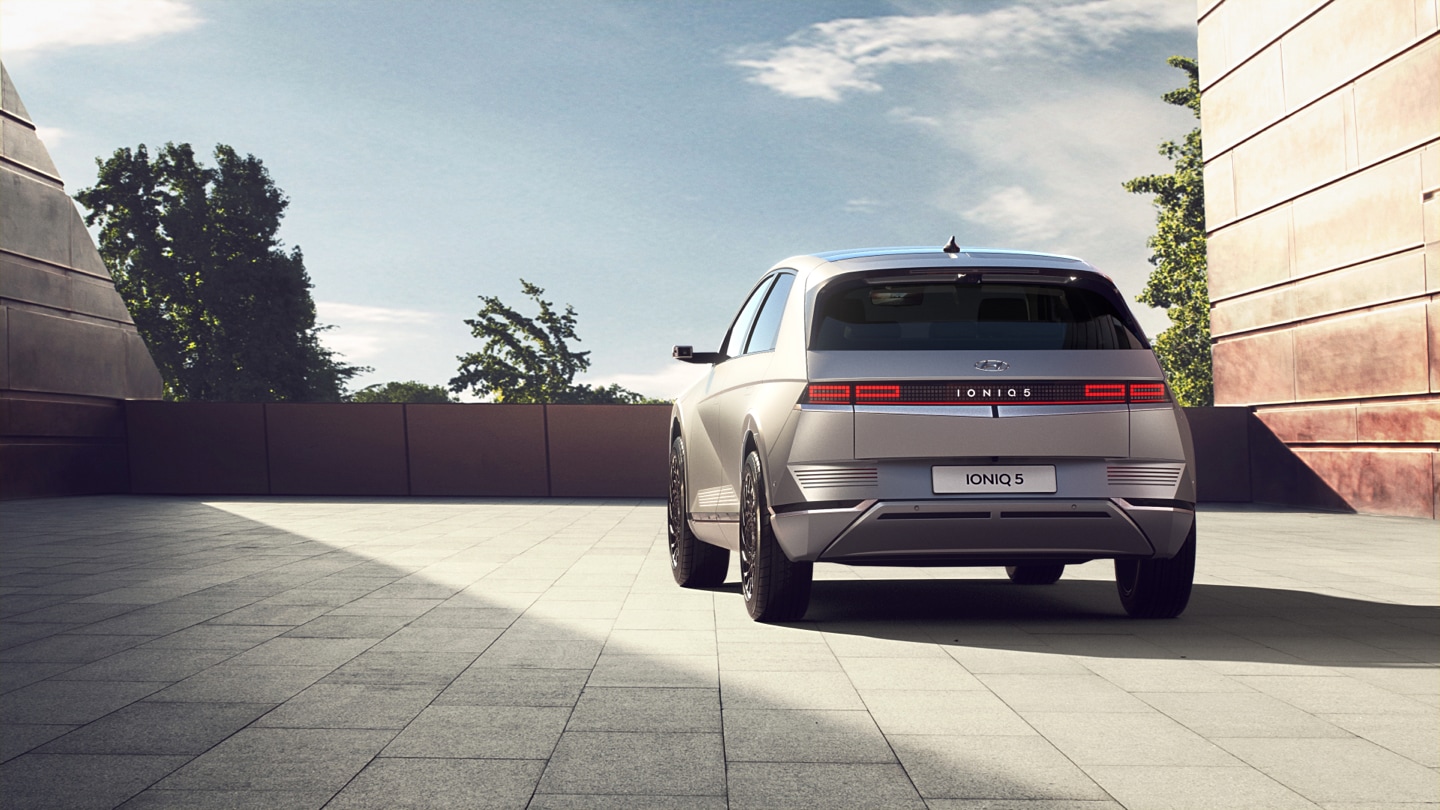 Hyundai IONIQ 5 in Gravity Gold Matte from the rear