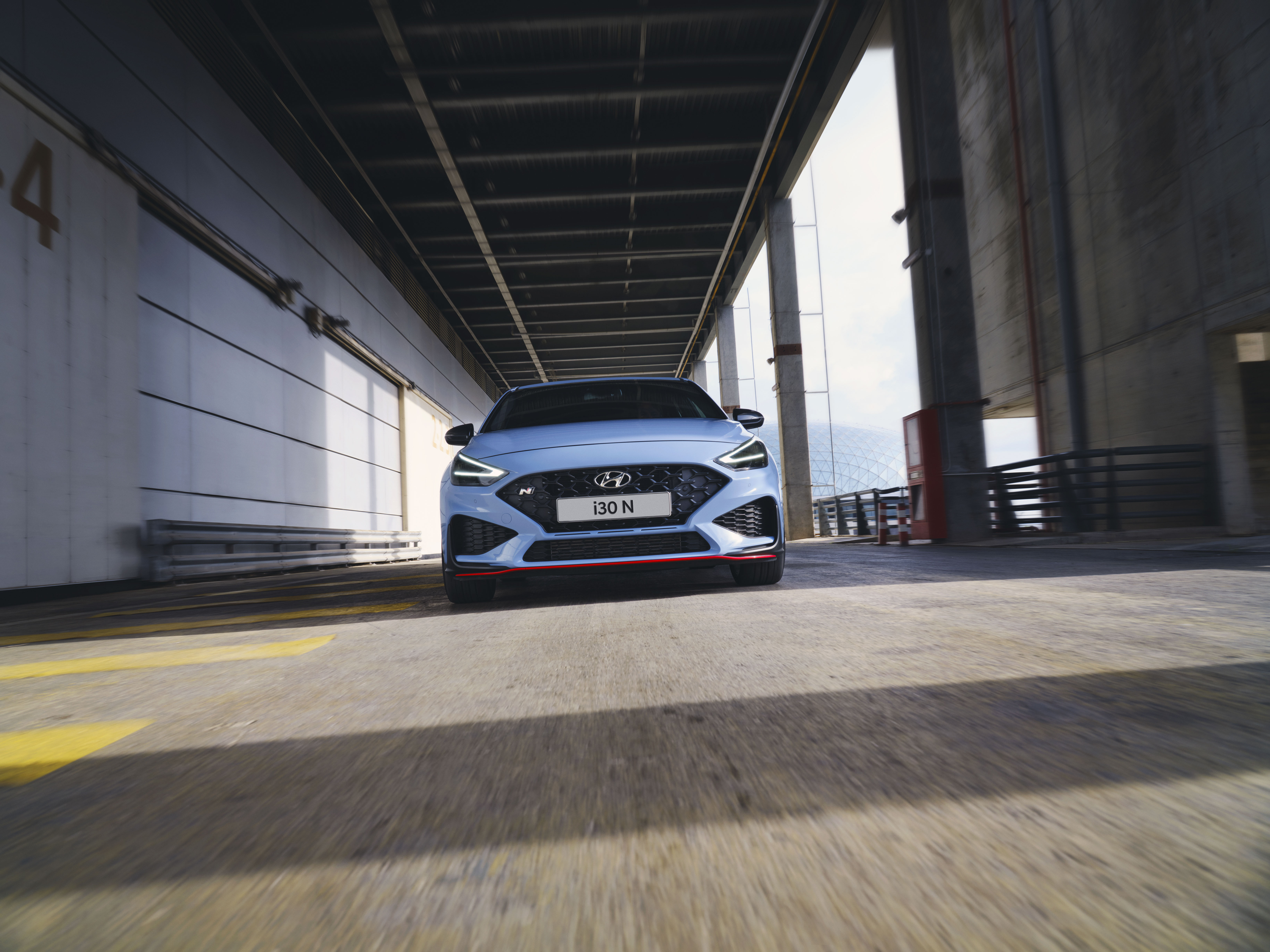 The Hyundai i30 N driving through a tunnel. 